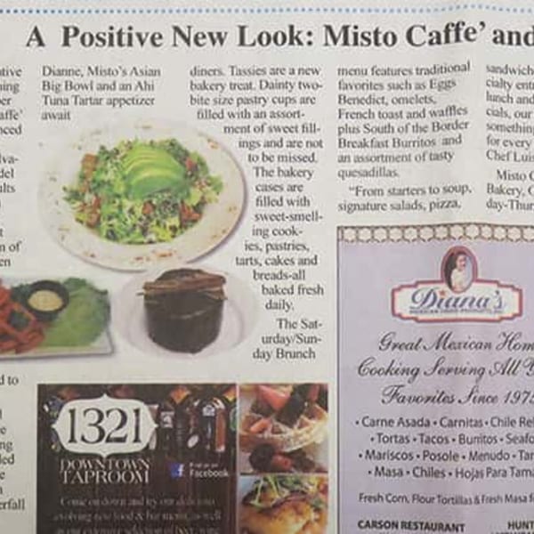 A newspaper clipping shows a Misto Caffe & Bakery salad with avocado, a dessert, and other food items.